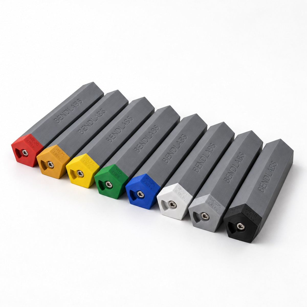 Tungsten holder tubes lying side by side with their coloured lids at the front